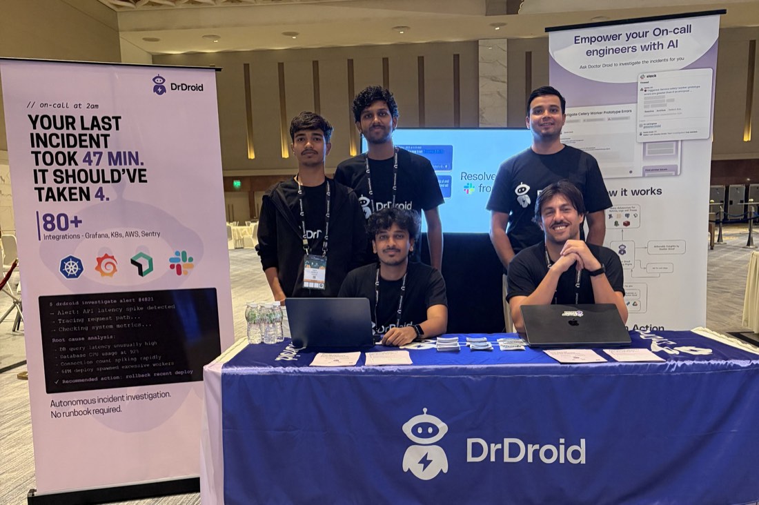 The DrDroid team at the KubeCon India booth
